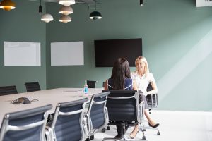 Two Business women in a conference room